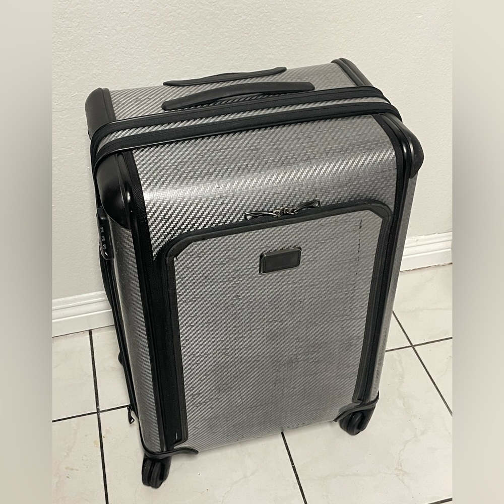 Tumi Tegris medium size check luggage